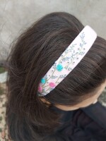 Embroidered soft hair band made with organic cotton and covered with soft fabric for that comfort for your little princess!