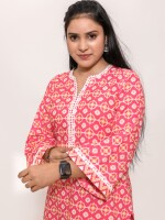 pure soft cotton pink and white printed apple cut kurta paired with matching zigzag pleated pants creates a fashionable and coordinated ensemble.