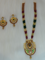 Traditional polki long set with hand-painted meenakari design on pendant