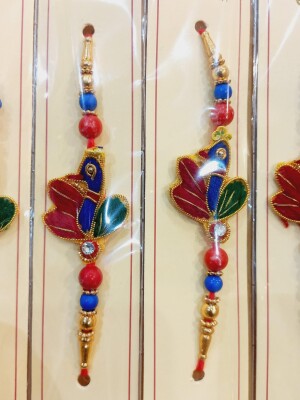 Peacock feather inspired multicolor rakhi for brother