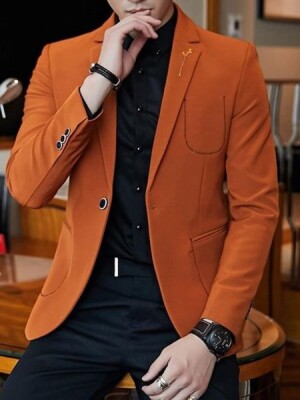 Orange blazer with a self-designed pattern