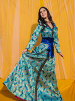 Peacock Blue Brocade Dress,Made with the rich brocade material with American crepe lining and raw silk belt with attached tassel