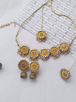 Haldi special light yellow kundan neckline with earrings tika bracelet jewlry set