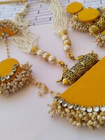 Rainvas Bright yellow and golden necklace earrings bracelet tika set