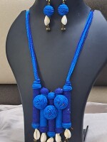 Exclusive handmade blue thread necklace with earrings.