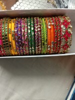 Exclusive,Handmade, multicoloured, silk thread bangles with Kundan for wedding and festive season.