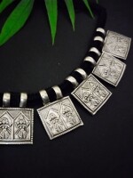 Tribal miniature pendants neckline