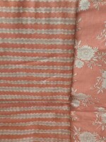 Peach cotton dress material featuring floral and striped pattern