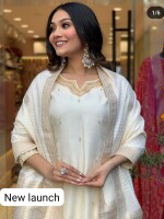 Pure dola silk kurta with exquisite handwork on neck and sleeves, paired with pants & banarasi dupatta