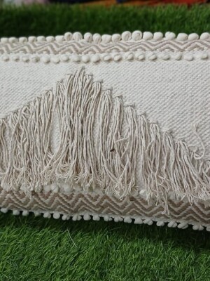 Elegant off-white 100% jute tufted long cushion cover