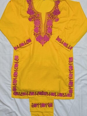 Yellow ruby cotton co-ord set with elegant pink aari work