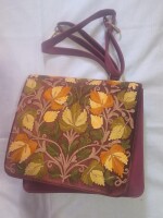 Artisanal sweed triple-layer leather sling bag with dual-sided hand embroidery