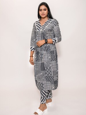 Grey pure cotton A-line pleated flared hand-printed kurta, paired with matching Leheriya print pants and yoke