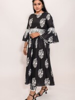 Flared printed black and white breathable cotton kurta with a designer lace yoke line and sleeves is chic and comfortable ensemble