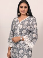 Straight-cut cotton grey and white floral printed kurta highlighted with lace and pearls, paired with Leheriya cotton pants.