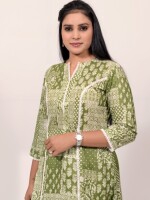 A-line cotton olive green printed kurti highlighted with lace on princess line, paired with Leheriya cotton pants