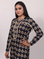 straight-cut blue cotton printed kurta with an elegant lace pattern on the sleeves and yoke line, paired with matching solid blue or beige cotton pant