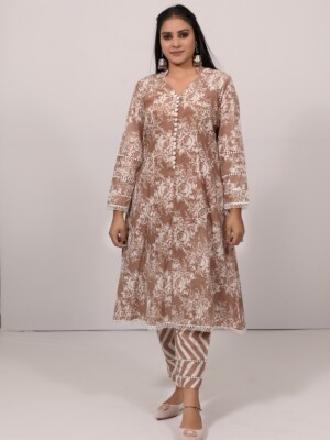 A-line cotton cappuccino color floral printed kurta with a center button line pattern and multilayered lace sleeves, paired with Leheriya cotton pants