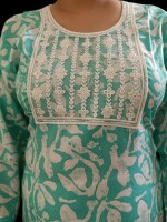 Pure cotton kurtis with embroidery over net at the yoke, style and comfort for various occasions.