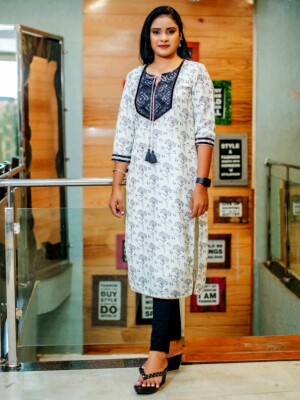 Chanderi Black & White Printed Straight Cut Kurti, offers a blend of comfort and style.