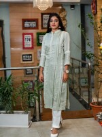 A pastel green, self-textured cotton full-length straight-cut kurta, embodies grace and sophistication