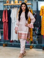 A blush pink, self-textured cotton short-length straight-cut kurta with bell frill sleeves, designed to radiate glamour and elegance