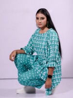 Turquoise Green Geometrical Print Top paired elegantly with contrasting Bandhani Print Pants
