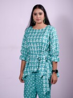 Turquoise Green Geometrical Print Top paired elegantly with contrasting Bandhani Print Pants