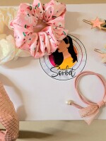 The Pink Hamper, a delightful assortment of hair accessories that will add a playful and stylish touch to your hairdo