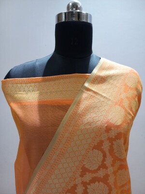 Banarasi Handloom Cotton Saree, a timeless creation that seamlessly blends the comfort of cotton with the opulence of Zari work