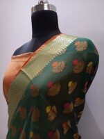 Banarasi Cotton Mercerized Saree adorned with enchanting Meena Motifs,  the timeless allure of traditional craftsmanship.