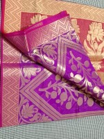 MAGENTA  Zari Brocade Silk Saree, a timeless piece that seamlessly blends traditional craftsmanship with contemporary elegance.