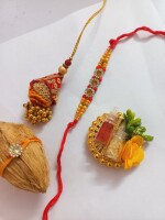 Beautiful bhai and Bhabhi lumba rakhi set with mini nariyal roli and chawal