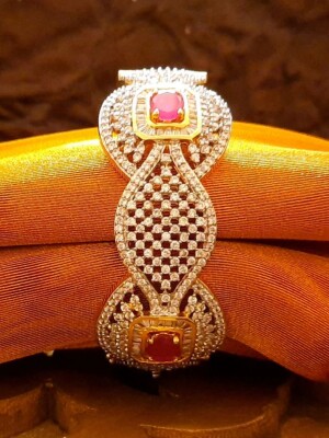 Elegant ruby & diamond scallop bracelet